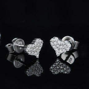 Heart-shaped diamond stud earrings featuring elegant moissanite diamonds in 925 silver