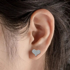 Heart-shaped diamond stud earring featuring elegant Moissanite diamonds in ear