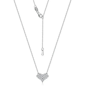 Delicate silver necklace with a heart-shaped pendant featuring elegant Moissanite diamonds