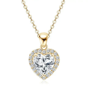 Heart shaped lab grown diamond pendant necklace with gold chain and halo setting