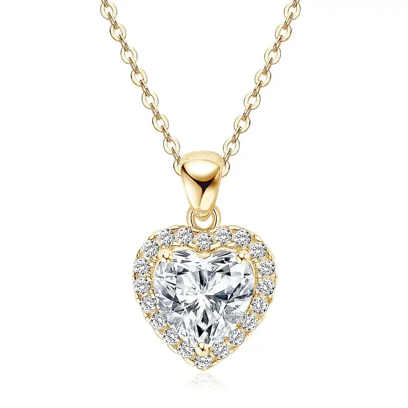 Heart shaped lab grown diamond pendant necklace with gold chain and halo setting