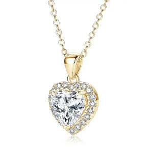 Heart shaped lab grown diamond pendant necklace with gold chain and halo setting