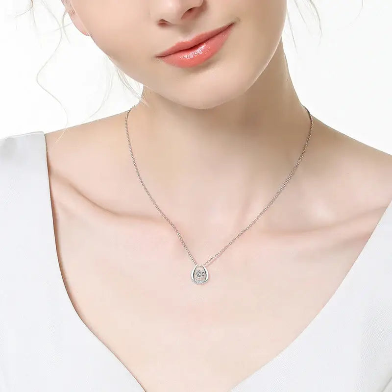 Delicate Horseshoe Pendant Necklace featuring a lab grown diamond and elegant teardrop design