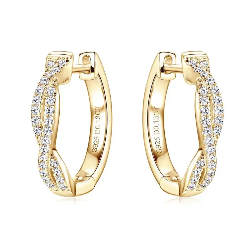 Pair of gold hoop earrings with diamond accents and a twisted design featuring Moissanite diamonds