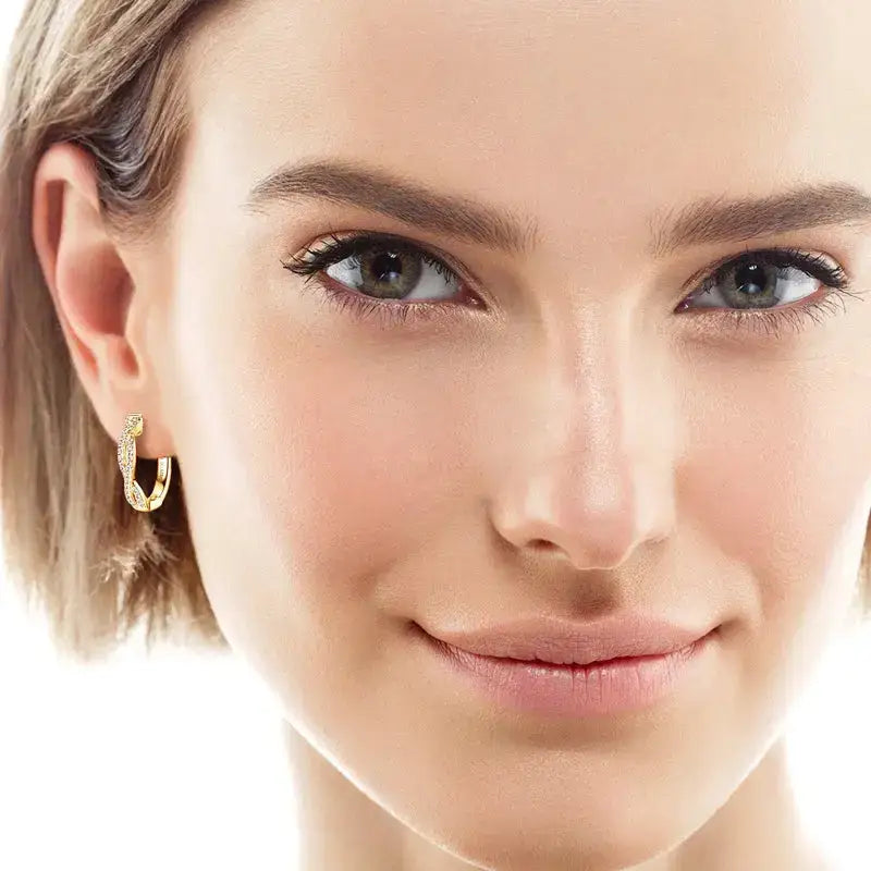 Close-up portrait of a woman wearing Infinity Eternity Earrings with moissanite diamonds