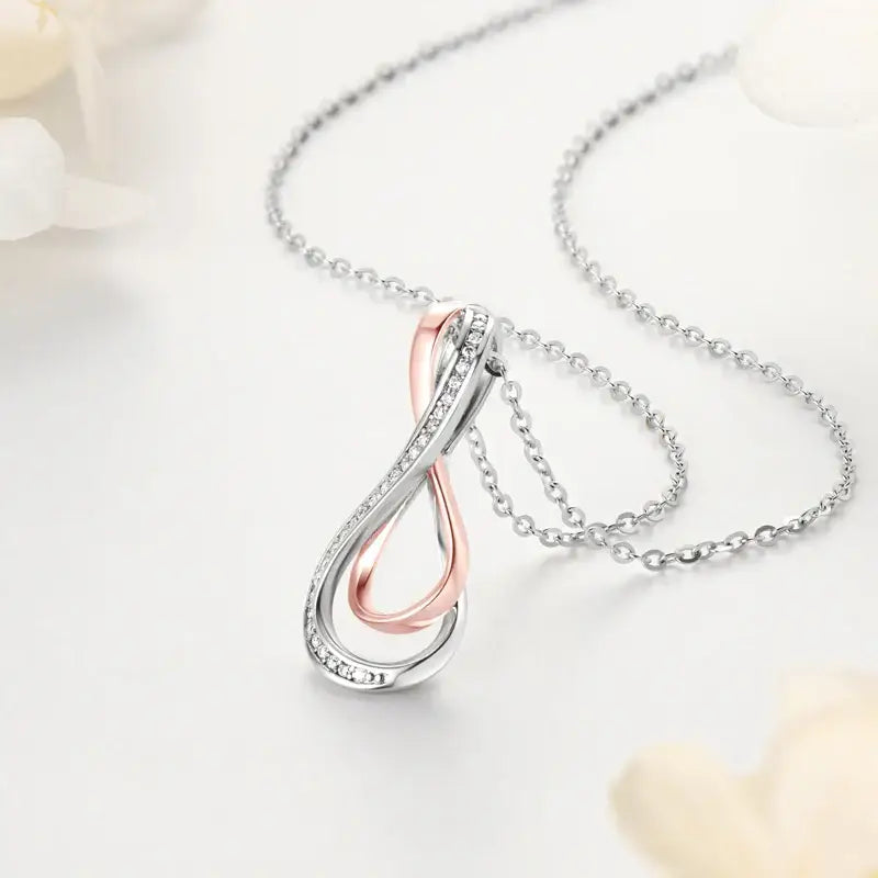 Delicate silver and rose gold Infinity Pendant Lab Grown Diamond Necklace with teardrop design