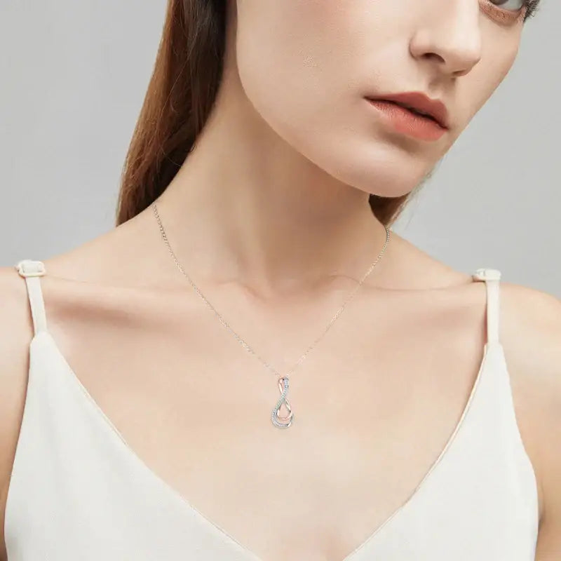 Delicate teardrop-shaped pendant on Infinity Pendant Lab Grown Diamond Necklace