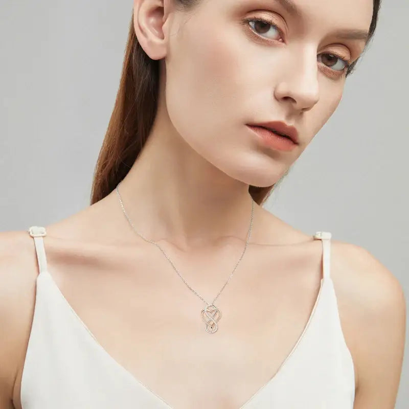 Delicate 925 Silver necklace featuring a lab grown diamond heart infinity pendant