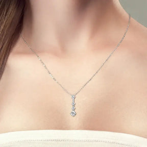 Delicate sterling silver long pendant necklace with lab grown diamond stones