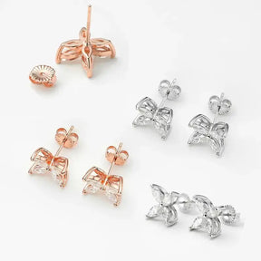 Collection of earring studs and posts in rose gold and silver tones with Pendant Butterfly Necklace