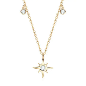 Gold necklace featuring a lab grown diamond star pendant with small gemstones