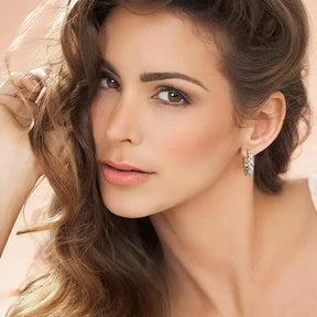 Woman with glamorous makeup showcasing Luxury Hoops Lab Grown Diamond Earrings