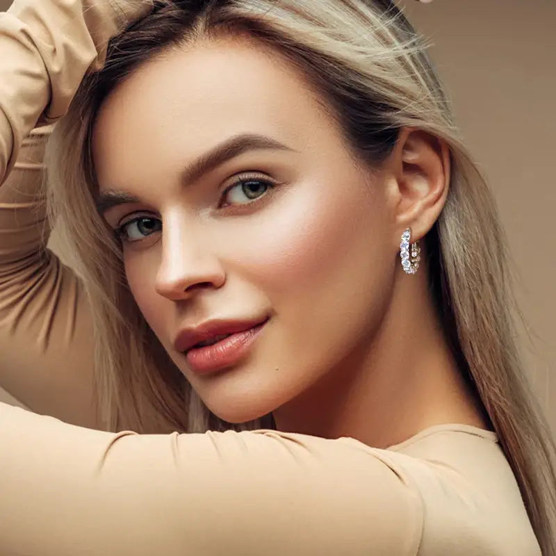 Close-up portrait of a young woman showcasing Luxury Hoops Lab Grown Diamond Earrings