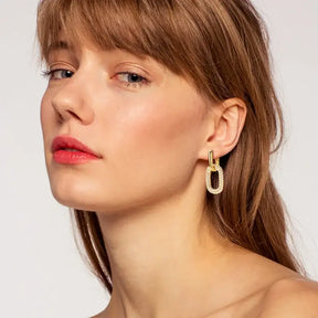 Gold-toned rectangular link earring with textured surface and lab grown diamond drops