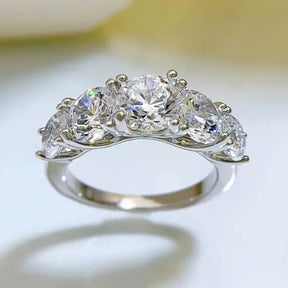 Sparkling Moissanite 5 Stone Wedding Band in sterling silver showcasing timeless sophistication