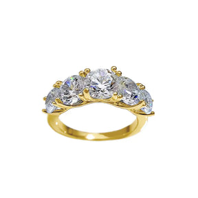 Gold ring with five round diamonds in graduated arrangement for Moissanite Wedding Band