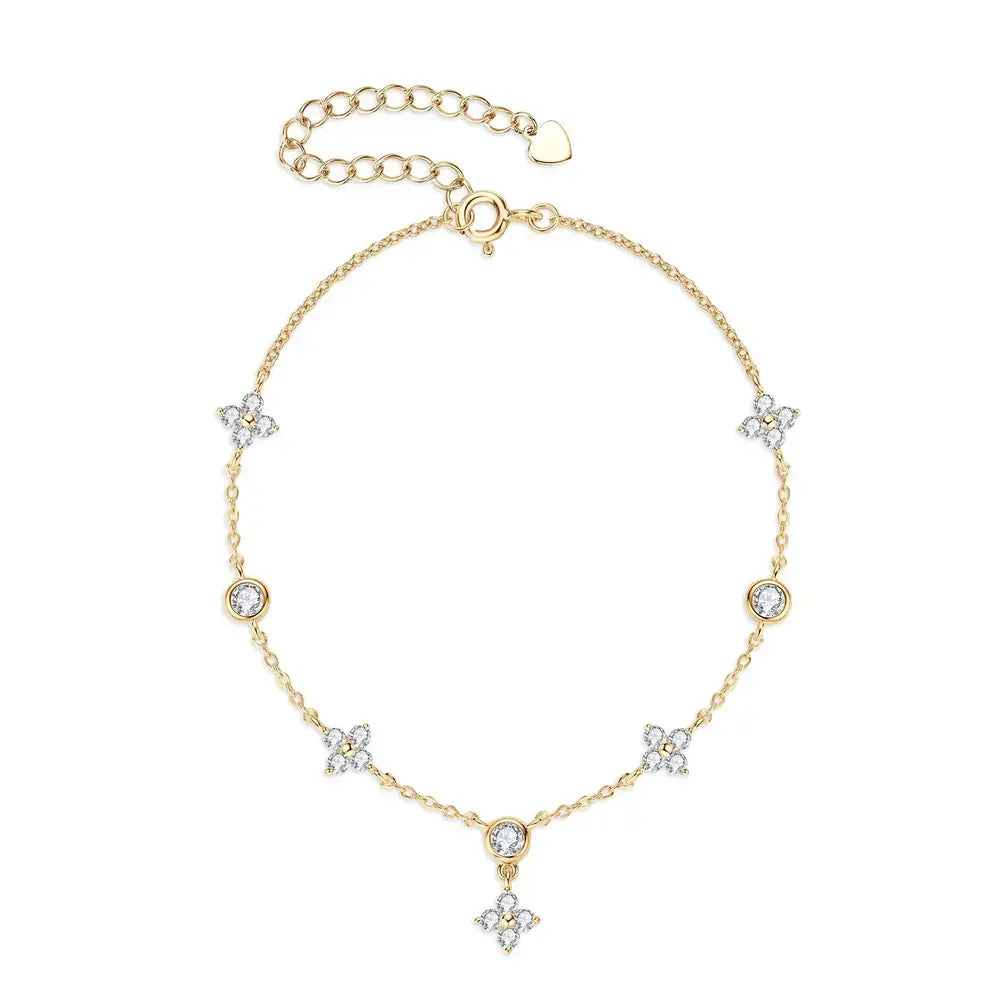 Delicate gold chain Moissanite bracelet with four-leaf flower design and diamond accents