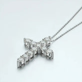 Diamond-studded cross pendant on a sterling silver chain in Moissanite Cross Necklace