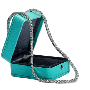 Teal jewelry box with diamond-encrusted chain for Moissanite Diamond Tennis Necklace