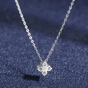 Delicate sterling silver necklace with Moissanite four-leaf flower pendant