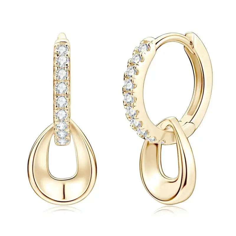 Gold hoop earrings with detachable dangle teardrop charms and diamond accents by Telles Jewelry