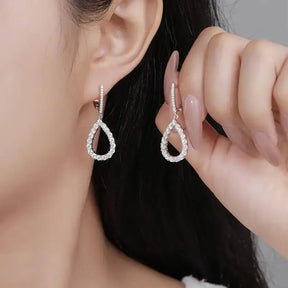 Teardrop-shaped Moissanite Pendant Earrings showcasing sparkling elegance and delicate design