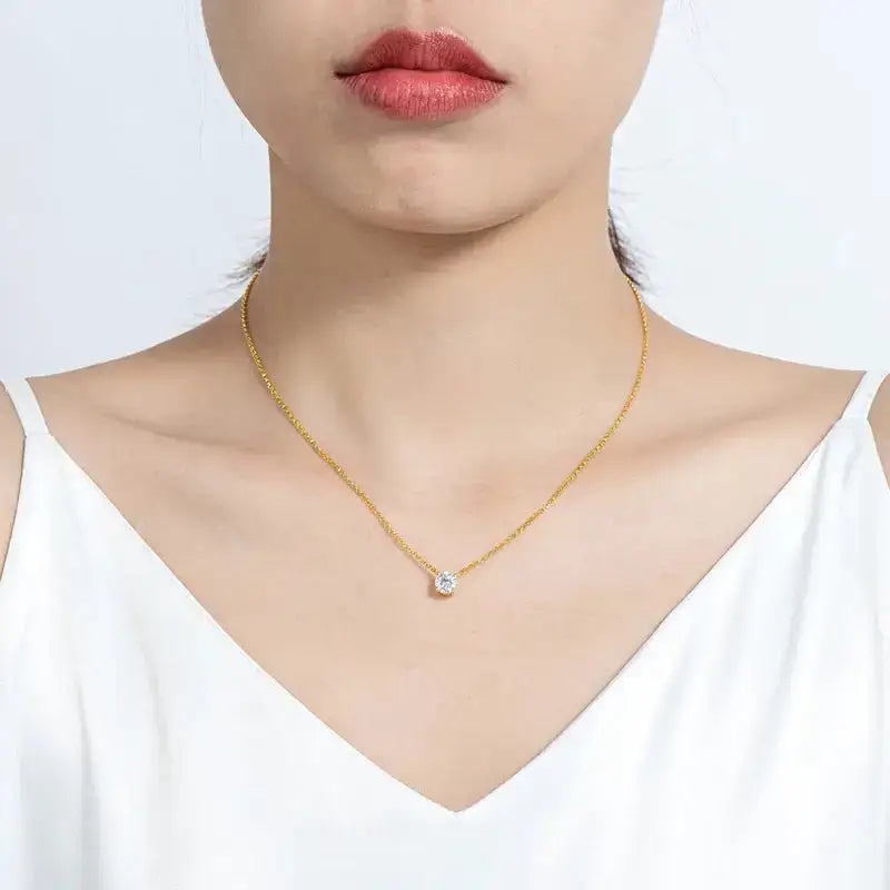 Delicate gold necklace with a pearl pendant and Moissanite pendant elegance