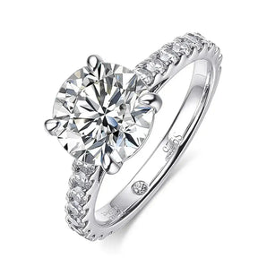 Moissanite Ring in 925 Sterling Silver with a round center stone and accent diamonds