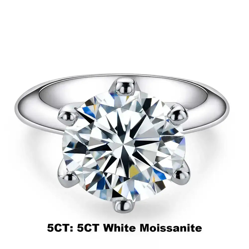 Sparkling round-cut Moissanite gemstone in a sterling silver gold solitaire engagement ring