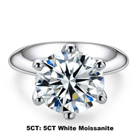 Sparkling round-cut Moissanite gemstone in a sterling silver gold solitaire engagement ring