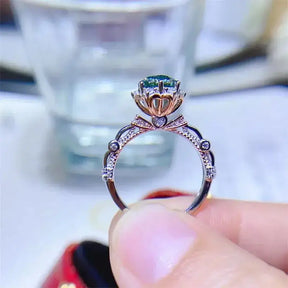 Ornate moissanite ring for women featuring teal gemstone in rose gold, 18K plated setting