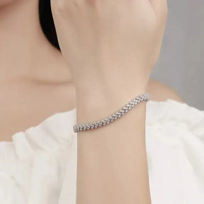 Silver chain bracelet on wrist showcasing Moissanite Tennis Bracelet in S925 Silver