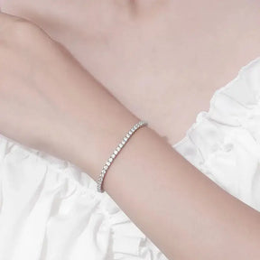 Delicate Moissanite Tennis Bracelet showcasing sparkling white gold elegance on wrist