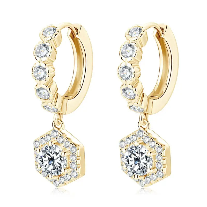 Gold hoop earrings with lab grown diamond accents and hexagonal dangling charms