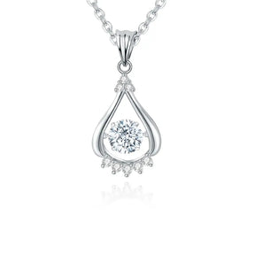 Teardrop-shaped silver necklace with lab grown diamond in sunflower design pendant