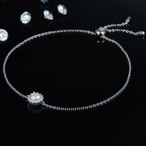 Delicate silver chain bracelet featuring a sparkling lab grown diamond sunflower design