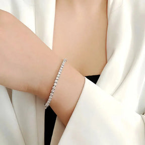 Delicate Moissanite Tennis Bracelet elegantly worn on wrist in S925 Sterling Silver