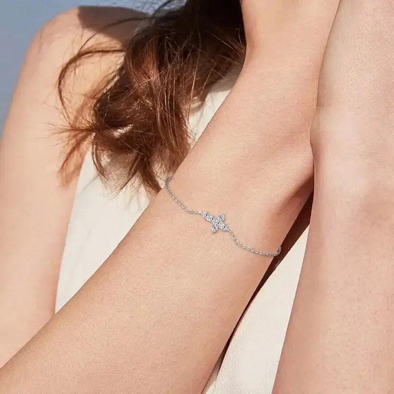 Delicate silver bracelet with a cross charm from the Real Moissanite Diamond Bracelet collection