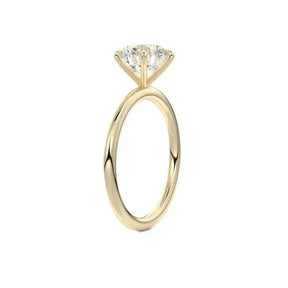 Gold engagement ring featuring a solitaire diamond in S925 Sterling Silver setting