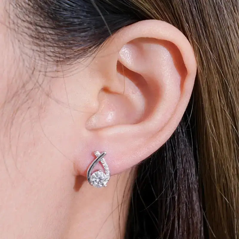 Delicate silver Cross Fishtail 5mm Moissanite stud earrings with teardrop design and crystals