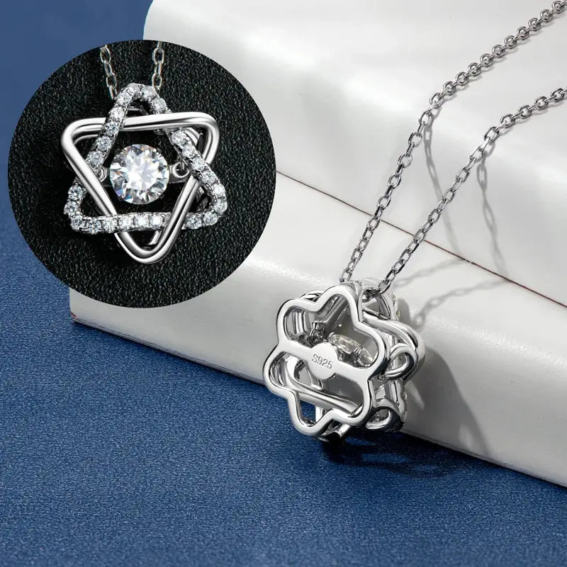 Star of David pendant necklace featuring a lab grown diamond in six-manifold star design