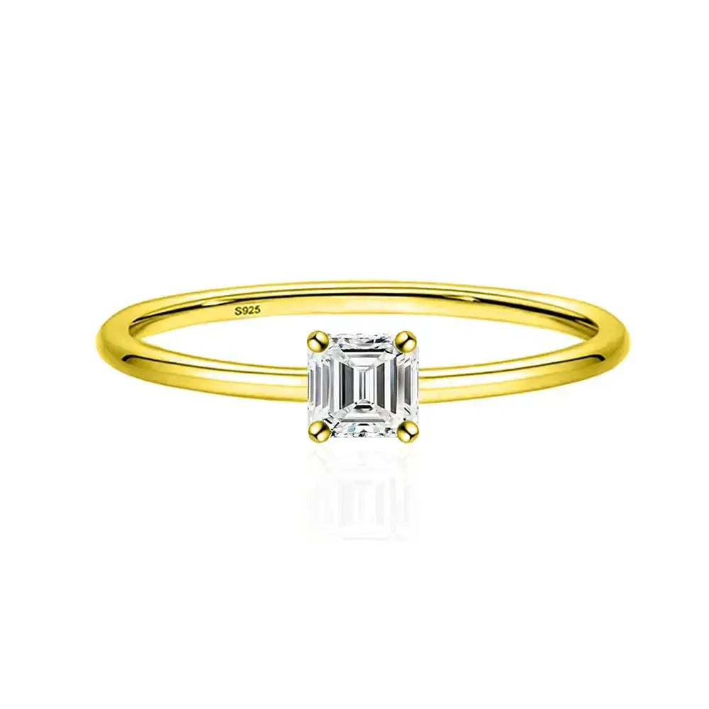 Gold ring featuring a square-cut Asscher cut moissanite diamond solitaire