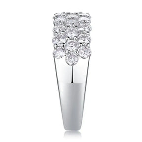 Diamond-encrusted white gold ring featuring sparkling GRA Moissanite in sterling silver