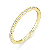 Delicate gold ring with diamonds, part of the Solid Gold Moissanite Wedding Band