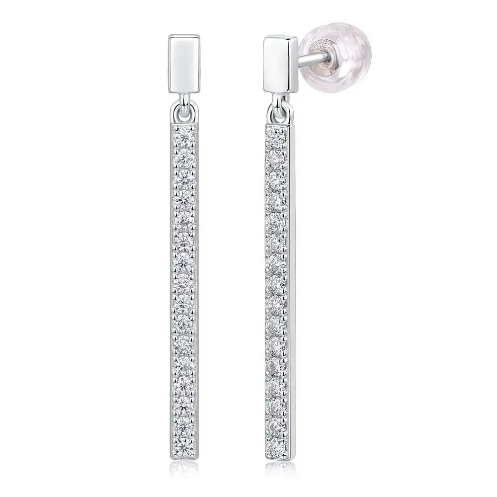 Long, slender moissanite diamond earrings in solid sterling silver with sparkling accents