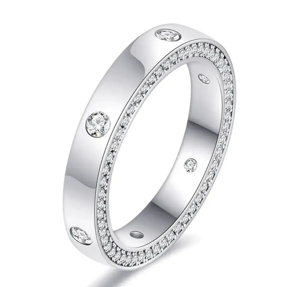 Elegant silver moissanite ring adorned with diamonds, ideal for engagements