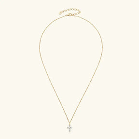 Gold chain necklace with a small cross pendant in sterling silver featuring 3mm moissanite