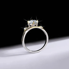 Sparkling Star Trail Moissanite Ring with center stone and accent diamonds in gold plating