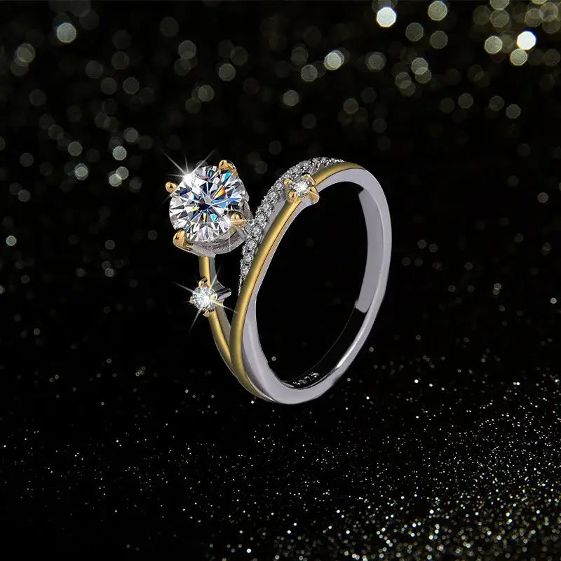 Diamond engagement ring with twisted gold and silver band from Star Trail Moissanite