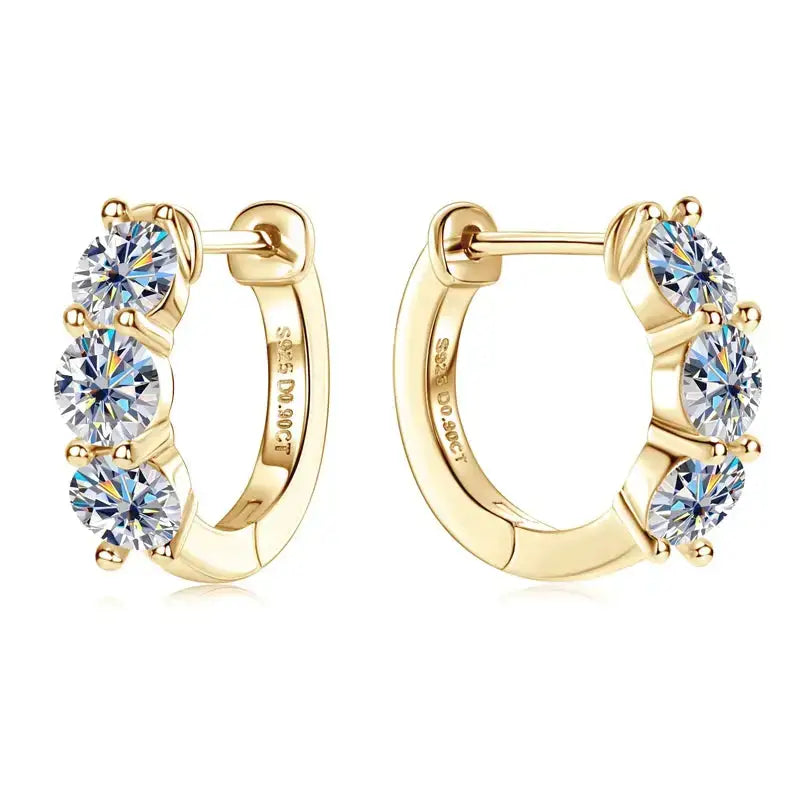 Gold hoop earrings with three 4mm Moissanite stones in a dazzling design